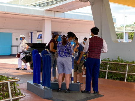 Orlando, FL USA-  August 3, 2020: People scanning their tickets to get into EPCOT  in Walt Disney World in Orlando, Florida.のeditorial素材