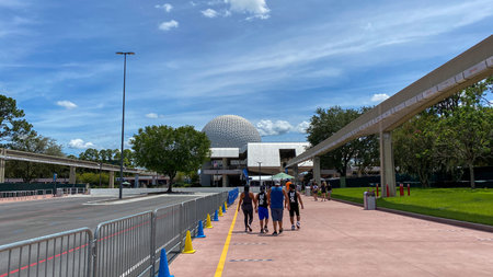 Orlando, FL USA-  August 3, 2020: People walking into EPCOT  in Walt Disney World in Orlando,...