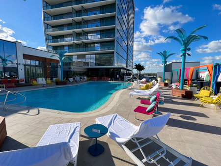 Orlando, FL USA -  December 23 2021: The outdoor amenities with a swimming pool, cabanas and lounge...