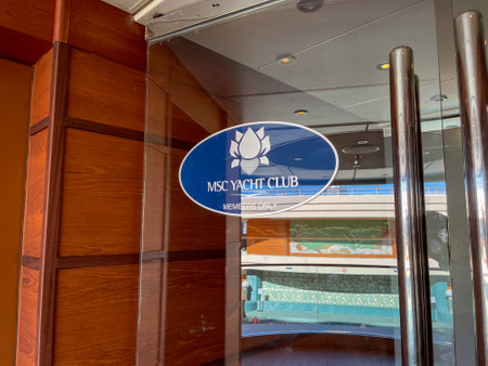 Orlando, FL USA - October 12, 2021:  The entrance to the exclusive area MSC Yacht Club aboard the cruise ship Divina.のeditorial素材