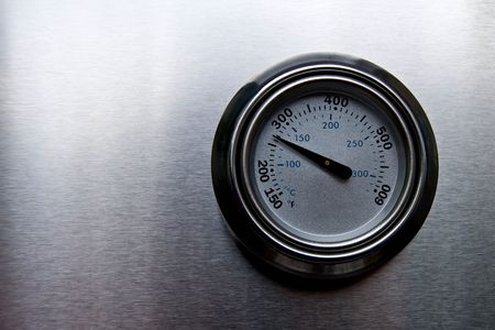 Temperature of BBQ grill displayed on the cover.の写真素材
