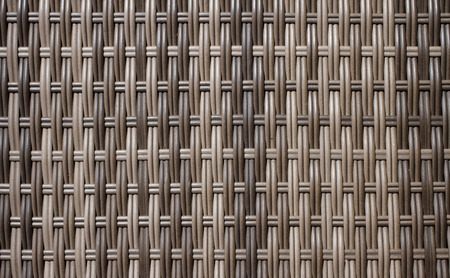 Wooden grid, the background of woven wood. Gray interlacing of wooden sticks.の写真素材