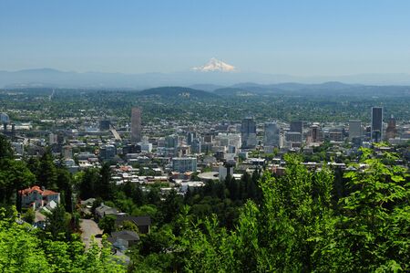 View Of Portland Skyline With Mount Rainier In The Backgroundの写真素材
