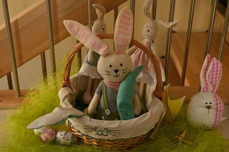 Fluffy Stuffed Easter Bunnies In A Basketの写真素材