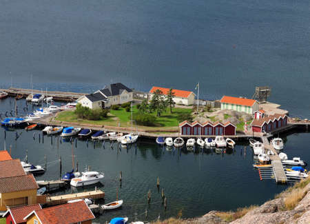 View From Vetteberget Hill To A Small Island In Fjallbacka On A Sunny Summer Day With Some Clouds In The Skyの写真素材