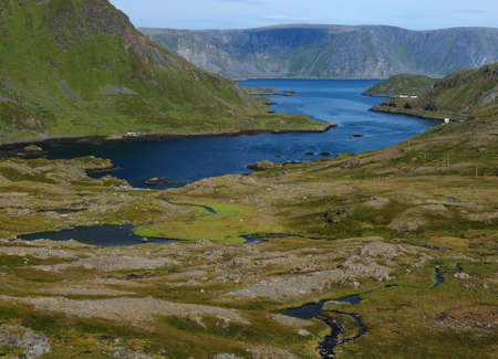 Beautiful And Barren Landscape Of Mageroya Island Close To The North Cape On A Sunny Summer Day With A Clear Blue Skyの写真素材