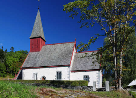 Picturesque Little Stone Chapel Dale Kirke At Dalsfjord On A Sunny Summer Day With A Clear Blue Cloudless Skyの写真素材