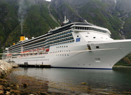 Large Cruiser Anchoring In Eidfjord On An Overcast Summer Dayの写真素材