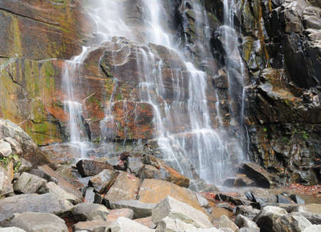 Long Time Exposure Of Flowing Water At Hickory Nut Falls At Chimney Rock State Park North Carolina On A Cloudy Autumn Dayの写真素材