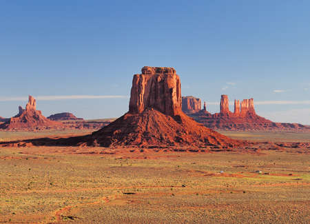 View From The Artist Point To The East Mitten Butte In The Monument Valley Arizona In The Morning On A Sunny Summer Day With A Clear Blue Skyの写真素材