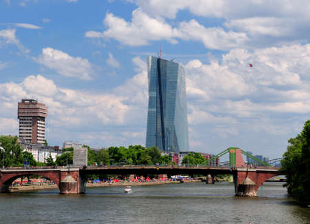 View From The Main River To The European Central Bank Tower In Frankfurt Am Main Hesse Germany On A Beautiful Summer Day With A Clear Blue Sky And A Few Cloudsのeditorial素材