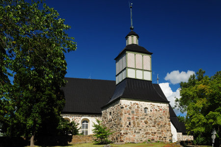 Old Bell Tower Of The Church In Pargas Finland On A Beautiful Sunny Summer Day With A Clear Blue Skyの写真素材