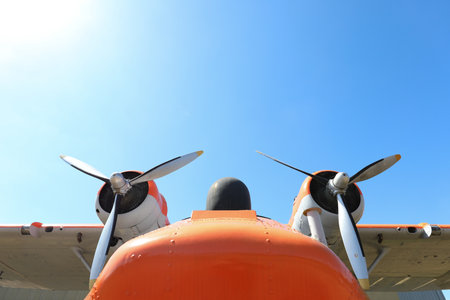 Close-up of the propeller of a small plane against the blue skyの写真素材