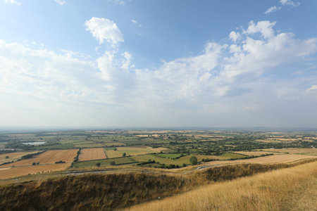 View of the English countryside from the top of a hill in summer