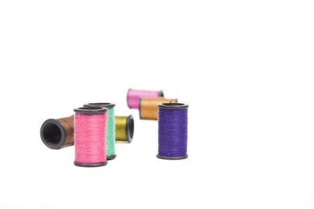 spools of thread strewn about with copy space