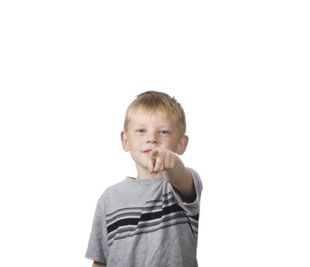 happy boy pointing fingerの写真素材