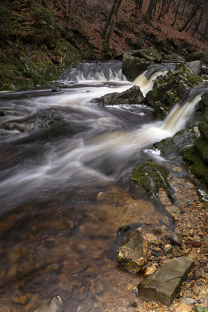 Waterfall in the river Hoegne near the small village Hockai in the Belgian region Ardennesの写真素材