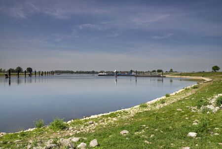 Harbour along the river Waal near the Dutch village Ochten in the province Gelderlandの写真素材