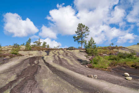 Himmelriket is a rocky slope near the Norwegian mountain hamlet Gautefall and has been created by a glacier during the last ice ageの写真素材