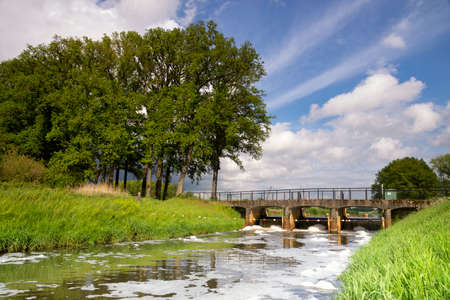 Weir in the river Aa near Heeswijk-Dintherの写真素材