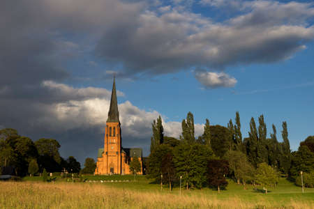 Undenas church lights up in the eveningの写真素材