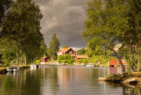 Dark sky over the Swedish village Sundbornの写真素材