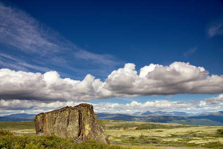 Giant rock on a Norwegian mountain plateau near Lesjaの写真素材