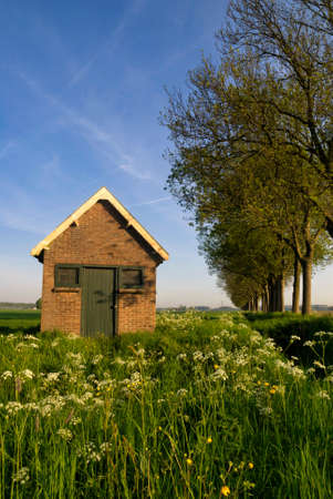 Shed in a field near the Dutch city Dordrechtの写真素材