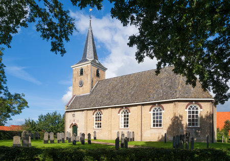 The Bonifatius church in the village Makkinga in the Dutch province frieslandの写真素材