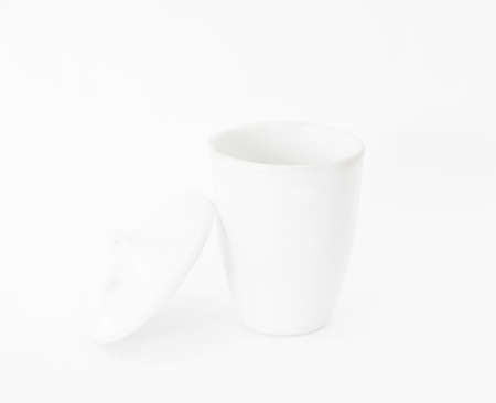 Crucible Porcelain Tall and lid on white background.
Scientific tile cup that can withstand high temperatures. can be used to test the ash value. Determination of organic or inorganic Burningの写真素材