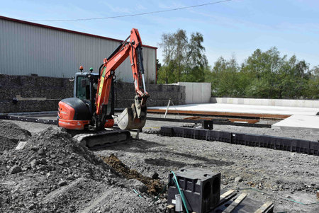 construction of the foundation of a new residential building in the cityの写真素材