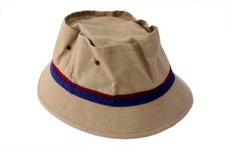 A wide brimmed canvas fishing hat that is slightly crinkled isolated on a white background の写真素材