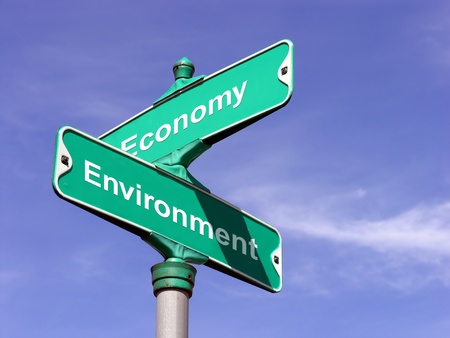 Economy VS Environment   A sign that symbolizes where economy and environment intersect の写真素材