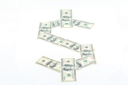 Bills one hundred dollars on white background.の写真素材
