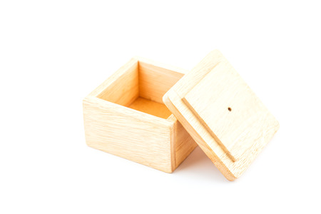 Wooden box with leather hook on white background.の写真素材