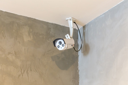 CCTV system security camera in building room.の写真素材