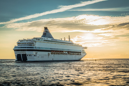 The ship sailing away from Latvia to Sweden in the evening, hdr effect backgroundの写真素材