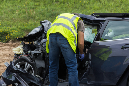 frontal collision of Ford and DAF truck, in Latvia on the A5 road, which occurred on the evening of August 20, 2018.A woman who was sitting in the back seat, in Ford and was not fastened with a seat belt - died on the spotのeditorial素材