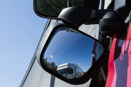 The collision of two trucks in Latvia, on the A8 road, occurred on August 23, 2018.The truck driver Iveco saw people on the pedestrian crossing and braked sharply, behind the driver who was driving Scania did not observe the distance and ran into Iveco. bのeditorial素材
