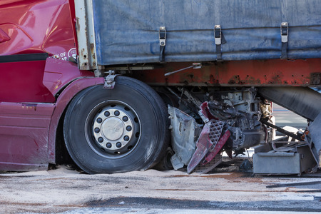 The collision of two trucks in Latvia, on the A8 road, occurred on August 23, 2018.The truck driver Iveco saw people on the pedestrian crossing and braked sharply, behind the driver who was driving Scania did not observe the distance and ran into Iveco. bのeditorial素材