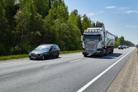 Car accident on a road in May 20, 2019 car after a frontal collision in Latvia next to Ozolnieki, transportation backgroundのeditorial素材