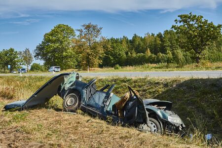 Svetciems, Latvia, August 29, 2019: accident on a road, car collision with a heavy truckのeditorial素材