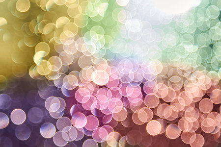 Blurred watter drops on window in a sunlight abstract color background