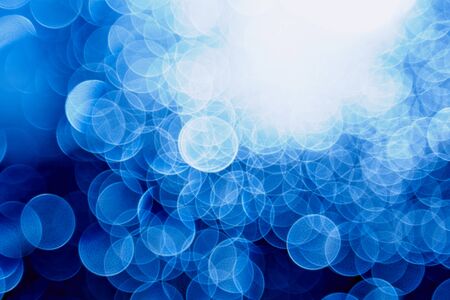 Blurred watter drops on window in a sunlight abstract color backgroundの写真素材
