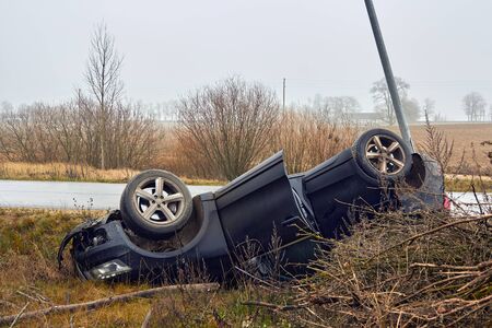 November 27, 2019, Sidgunda, Latvia: Car accident on the slippery road, the car was equipped with inappropriate tiresの写真素材