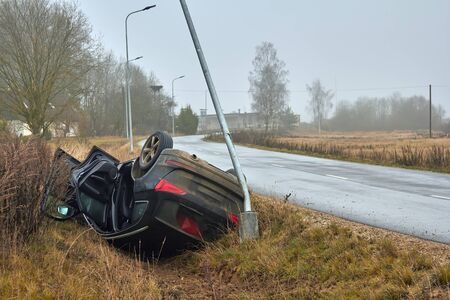 November 27, 2019, Sidgunda, Latvia: Car accident on the slippery road, the car was equipped with inappropriate tiresの写真素材