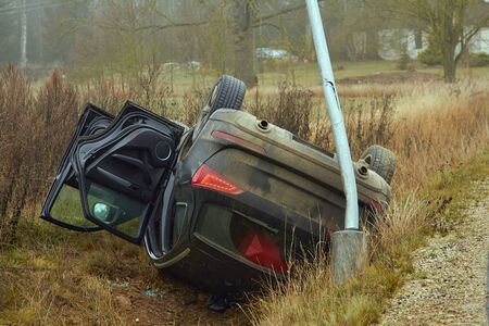 November 27, 2019, Sidgunda, Latvia: Car accident on the slippery road, the car was equipped with inappropriate tiresの写真素材