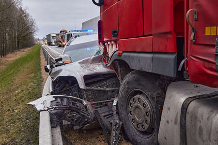 January 24, 2020, Sauriesi, Latvia: car after a collision with a heavy truck, transportation backgroundのeditorial素材
