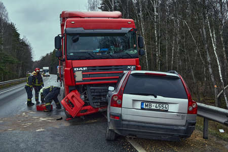 January 24, 2020, Sauriesi, Latvia: car after a collision with a heavy truck, transportation backgroundのeditorial素材