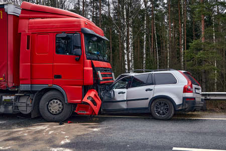 January 24, 2020, Sauriesi, Latvia: car after a collision with a heavy truck, transportation backgroundのeditorial素材